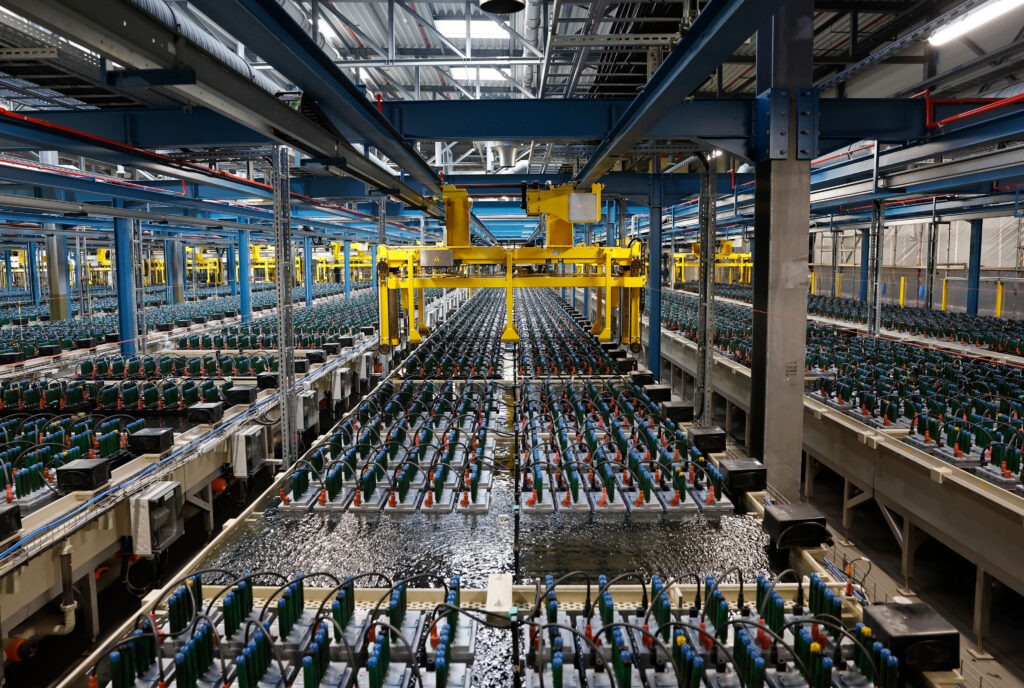 Large-scale industrial battery manufacturing facility with automated production lines